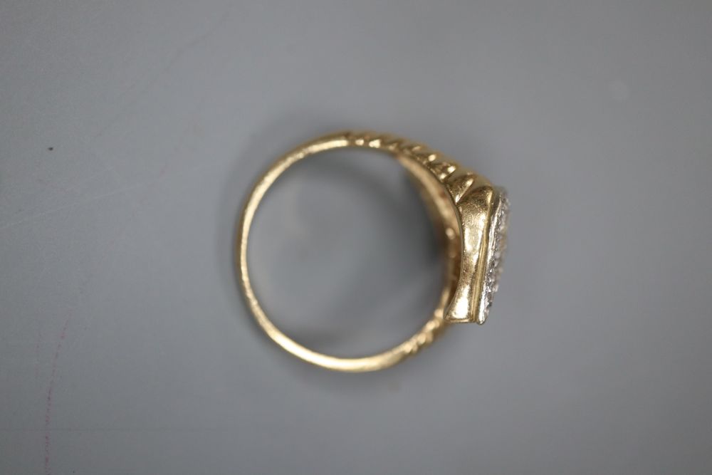 A modern 14k and diamond chip set double cluster ring, size H, gross 2.9 grams.